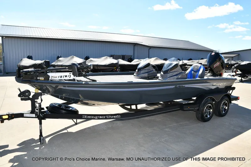 Slide: The Image of 2025 Ranger Alpha 208 Dual Console boat on trailer. - 28