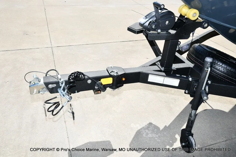 Slide: The Image of Trailer of Ranger Alpha 208 Dual Console 2025 on concrete surface. - 31