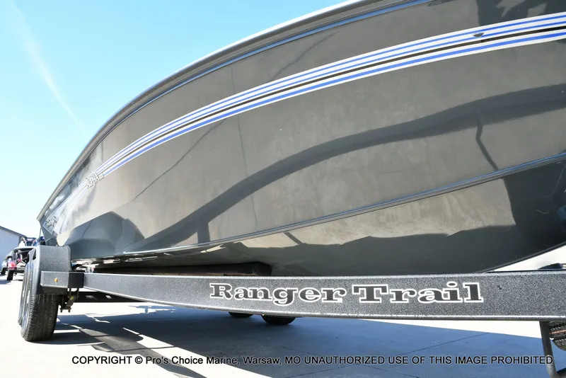 Slide: The Image of Ranger Alpha 208 Dual Console 2025 on trailer, side view. - 33