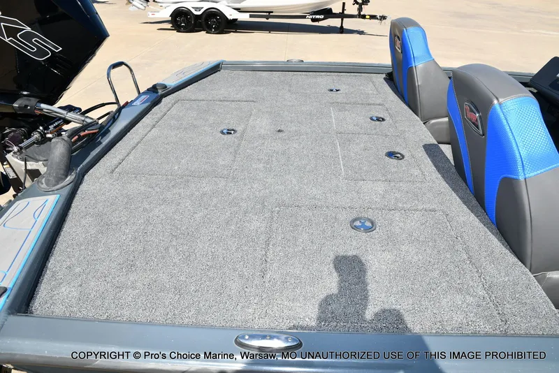 Slide: The Image of Ranger Alpha 208 Dual Console 2025 with gray carpeted deck. - 38