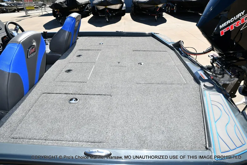 Slide: The Image of Ranger Alpha 208 Dual Console 2025 with gray deck and blue seats. - 41