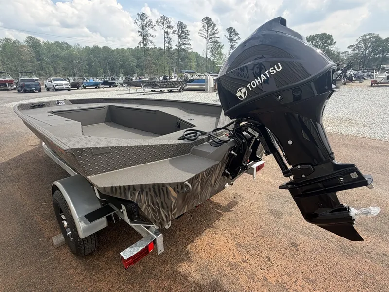 Slide: The Image of 2026 Alweld 756 INVADER boat with Tohatsu motor outdoors. - 7