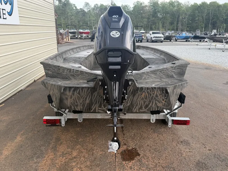 Slide: The Image of 2026 Alweld 756 INVADER boat with outboard motor on trailer. - 4