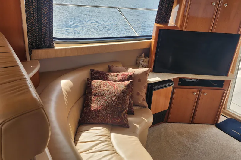 Slide: The Image of Luxurious interior of 2003 Meridian 411 Sedan with plush seating and modern entertainment system. - 3