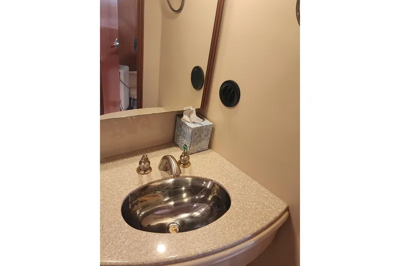 Slide: The Image of Luxurious bathroom sink in 2003 Meridian 411 Sedan yacht. - 33