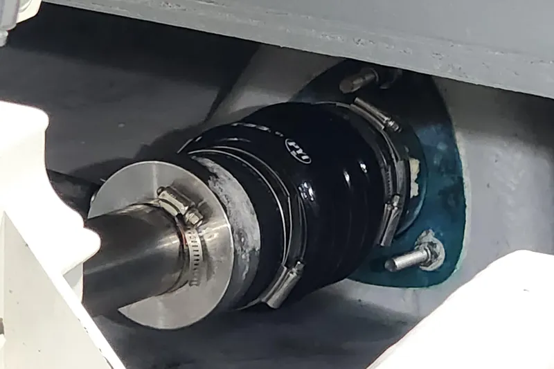 Slide: The Image of Close-up of a 2003 Meridian 411 Sedan boat shaft seal assembly. - 58