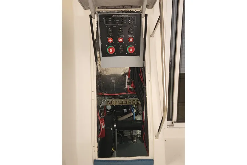 Slide: The Image of Electrical panel and wiring inside a 2003 Meridian 411 Sedan boat. - 64