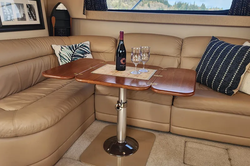 Slide: The Image of Luxurious interior of 2003 Meridian 411 Sedan with wine and glasses on table. - 7