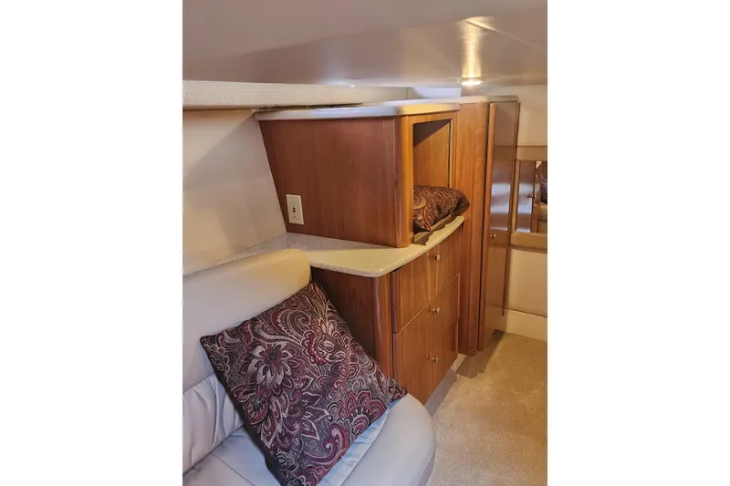 Slide: The Image of Interior of 2003 Meridian 411 Sedan with wooden cabinetry and patterned cushion. - 8