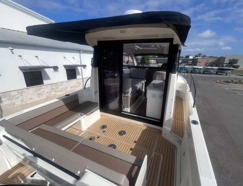 Slide: The Image of 2026 Bayliner T29EX with spacious deck and modern interior design. - 12