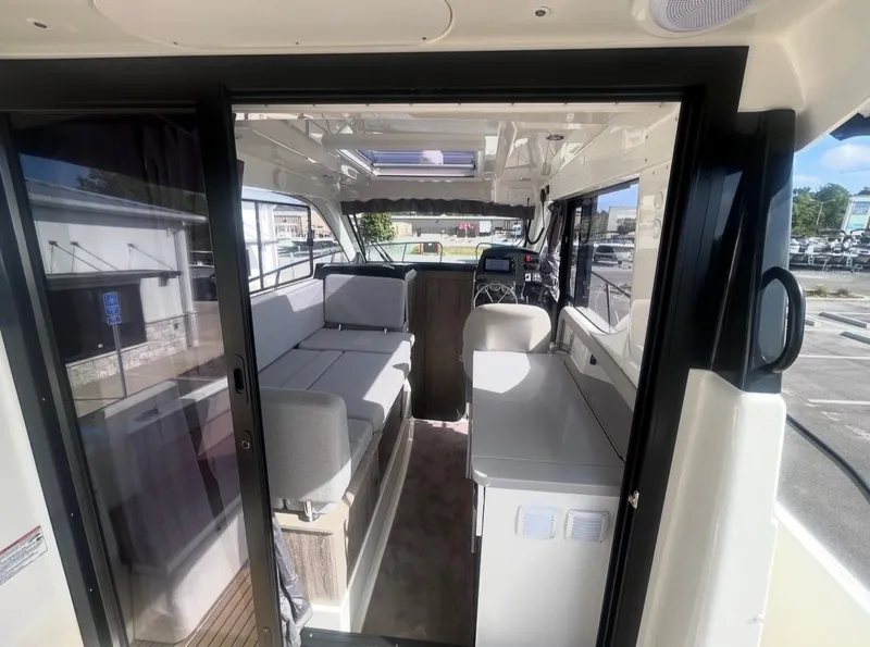 Slide: The Image of Interior of 2026 Bayliner T29EX with modern amenities. - 13