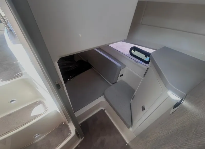 Slide: The Image of Interior of 2026 Bayliner T29EX with gray upholstery. - 20