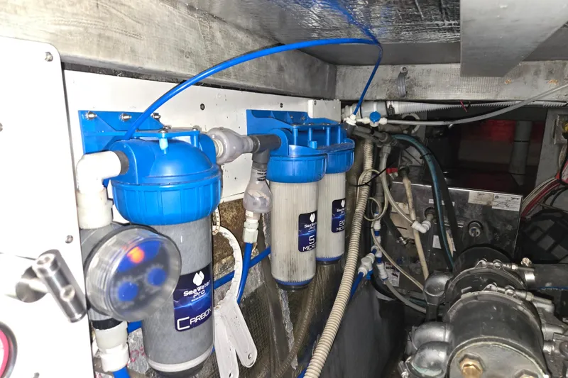 Slide: The Image of Engine room of 2003 Endeavour Trawler Cat 44 with water filtration system. - 103