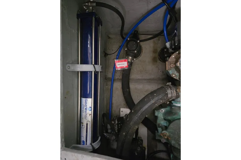 Slide: The Image of Engine compartment of 2003 Endeavour Trawler Cat 44 with Seawater Pro filtration system. - 104