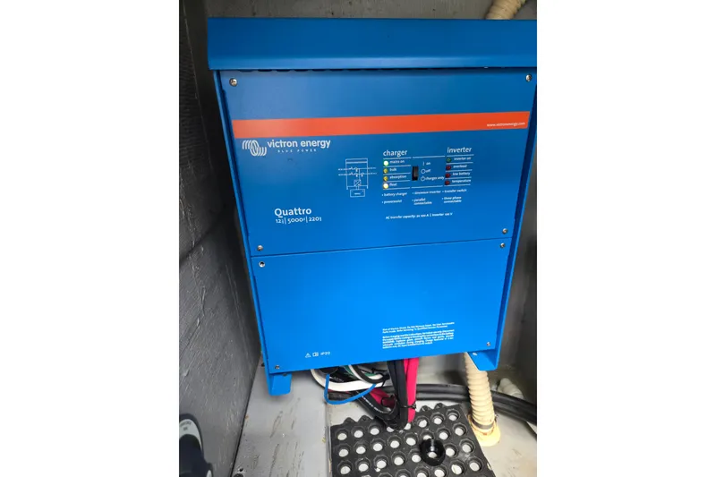 Slide: The Image of Victron Energy Quattro inverter in 2003 Endeavour Trawler Cat 44 boat. - 106