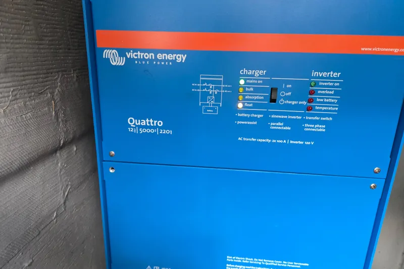 Slide: The Image of Victron Energy Quattro inverter charger on 2003 Endeavour Trawler Cat 44 boat. - 107