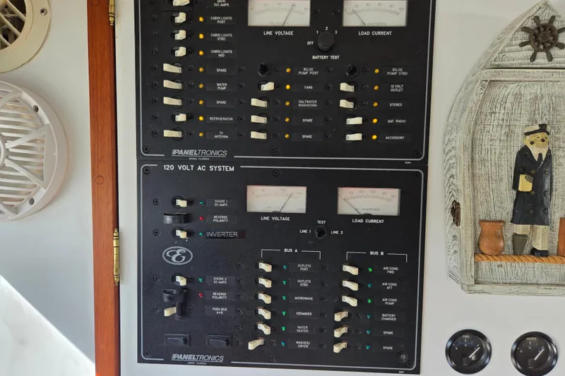 Slide: The Image of Electrical panel of a 2003 Endeavour Trawler Cat 44 with nautical decor. - 22