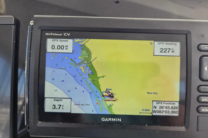 Slide: The Image of Garmin GPS display on 2003 Endeavour Trawler Cat 44, showing navigation map and coordinates. - 37