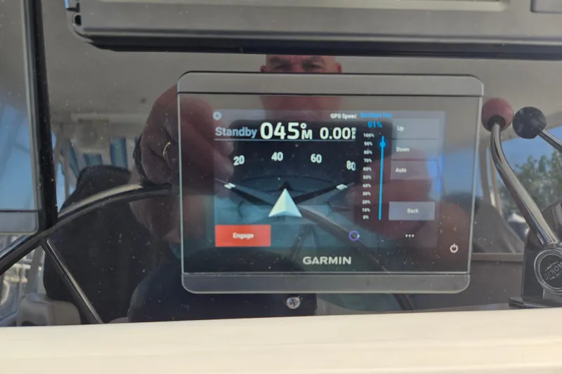 Slide: The Image of Garmin navigation display on 2003 Endeavour Trawler Cat 44, showing standby mode and controls. - 38