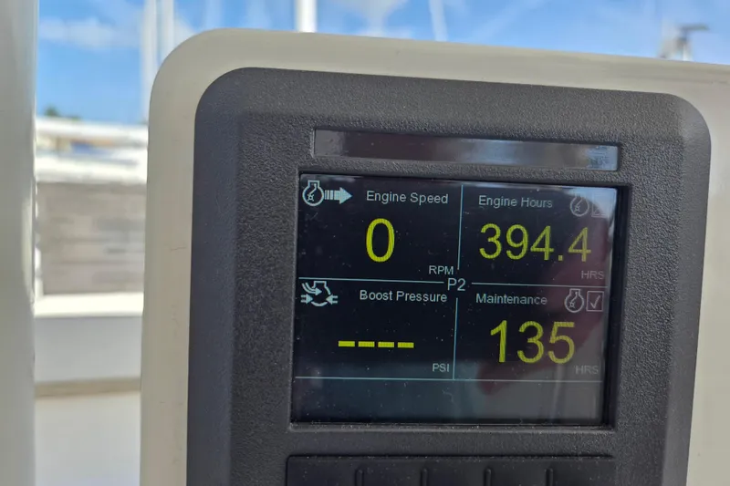 Slide: The Image of Engine display of 2003 Endeavour Trawler Cat 44 showing 394.4 engine hours. - 41