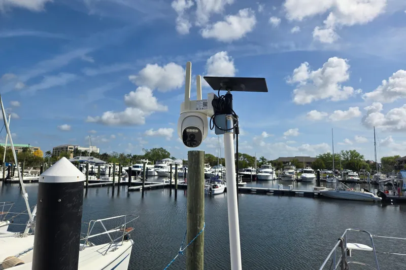 Slide: The Image of Marina view with security camera and solar panel, featuring Endeavour Trawler Cat 44, 2003. - 82