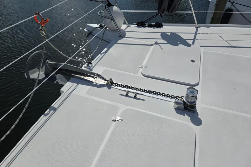 Slide: The Image of Deck of 2003 Endeavour Trawler Cat 44 with anchor chain and winch system. - 84