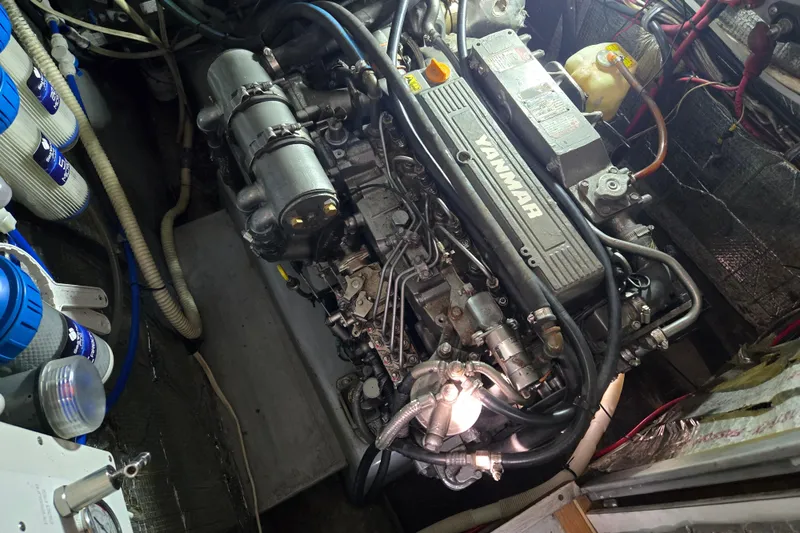 Slide: The Image of Engine room of 2003 Endeavour Trawler Cat 44 with Yanmar engine and filtration system. - 98