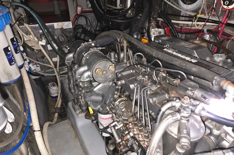 Slide: The Image of Engine room of a 2003 Endeavour Trawler Cat 44 with Yanmar engine components. - 99
