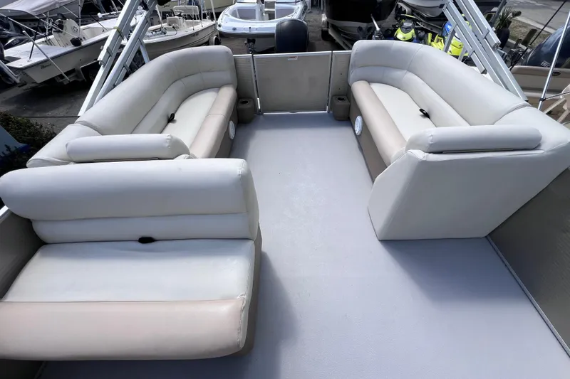 Slide: The Image of Interior of 2020 Godfrey Sweetwater 2286 Tritoon with spacious seating and modern design. - 14