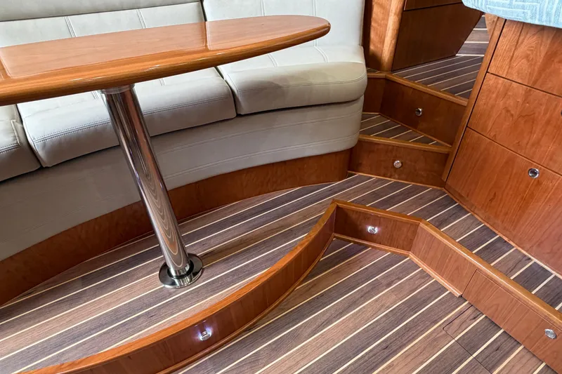 Slide: The Image of Interior of 2026 Albemarle 36 Express yacht with wooden flooring and seating area. - 3