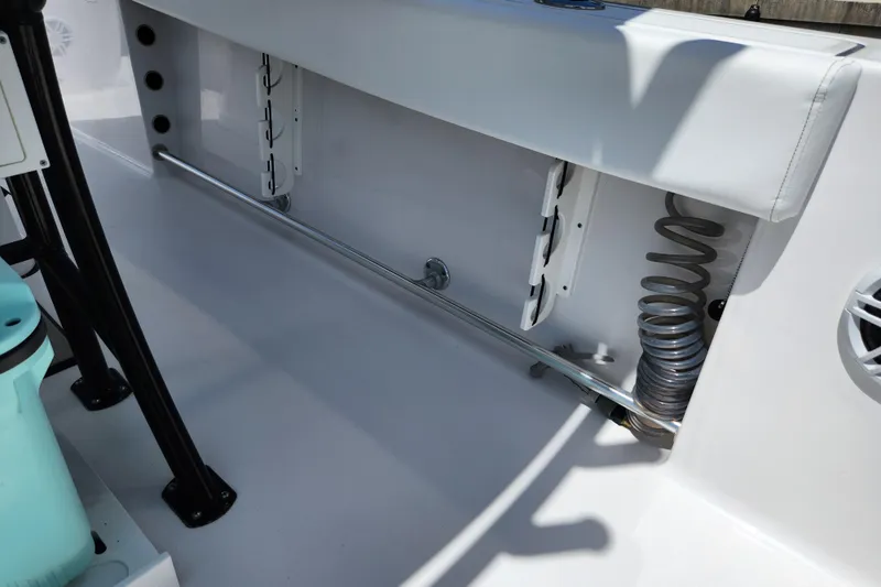 Slide: The Image of 2024 Sportsman Open 232 Center Console interior detail with storage and seating features. - 22