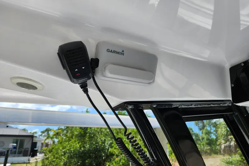 Slide: The Image of 2024 Sportsman Open 232 Center Console with Garmin marine radio installed. - 33