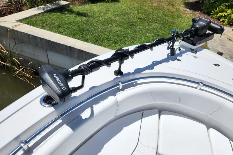 Slide: The Image of 2024 Sportsman Open 232 Center Console with Garmin trolling motor on deck. - 36