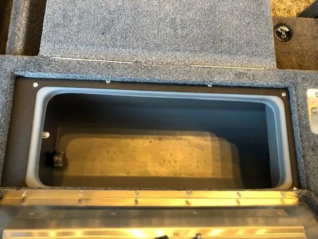 Slide: The Image of Interior view of a 2026 Tracker PRV 175CB boat storage compartment. - 14