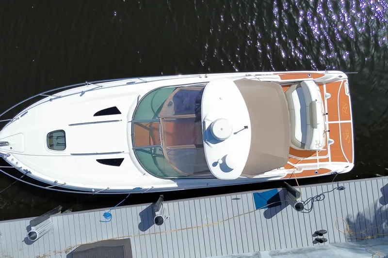 Slide: The Image of Aerial view of 2007 Sea Ray Sundancer 310 docked at a marina. - 47