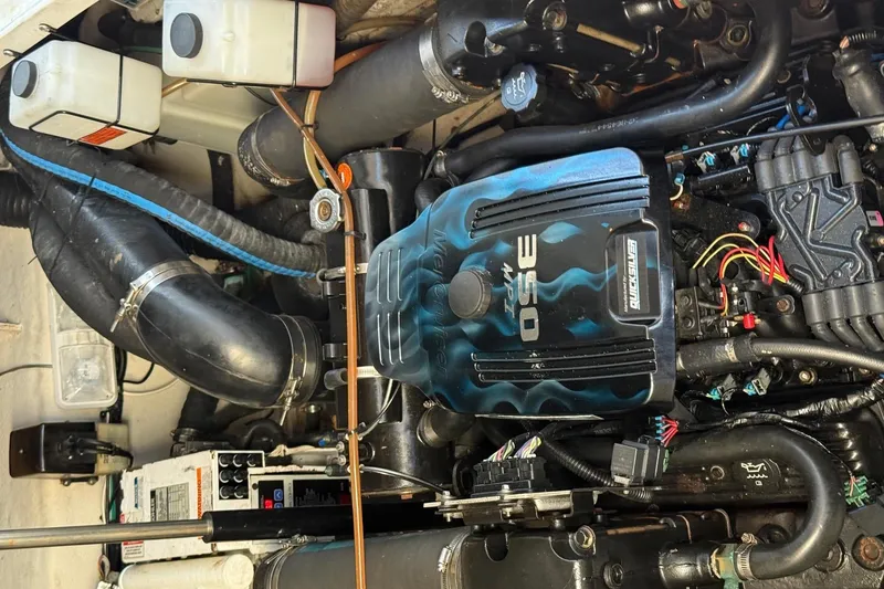 Slide: The Image of Engine compartment of a 2007 Sea Ray Sundancer 310 boat, featuring a MerCruiser 496 MAG engine. - 50
