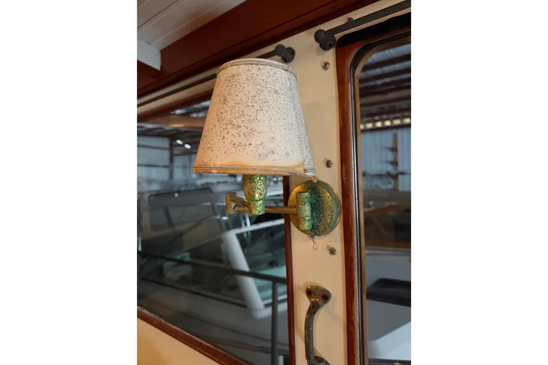 Slide: The Image of Vintage wall sconce on 2003 Snug Harbor Shearwater boat interior. - 18