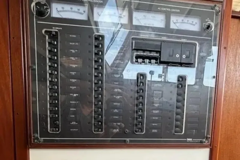 Slide: The Image of Electrical control panel on a 2003 Snug Harbor Shearwater boat. - 26