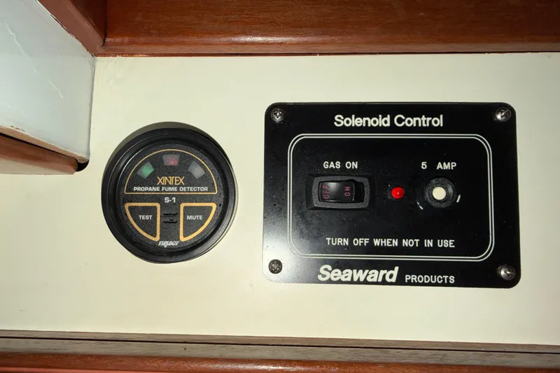 Slide: The Image of Control panel with Xintex propane fume detector and Seaward solenoid control on Snug Harbor Shearwater. - 34