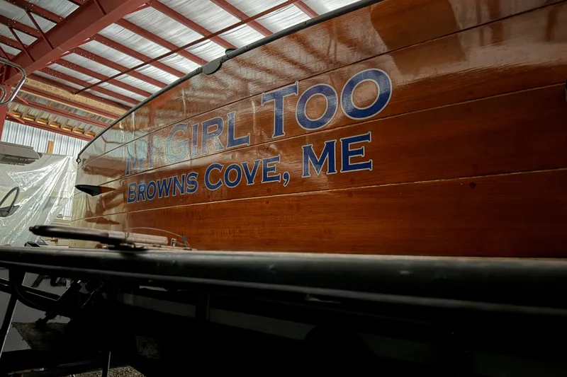 Slide: The Image of Wooden boat "My Girl Too" from Browns Cove, ME, in a covered storage area. - 5
