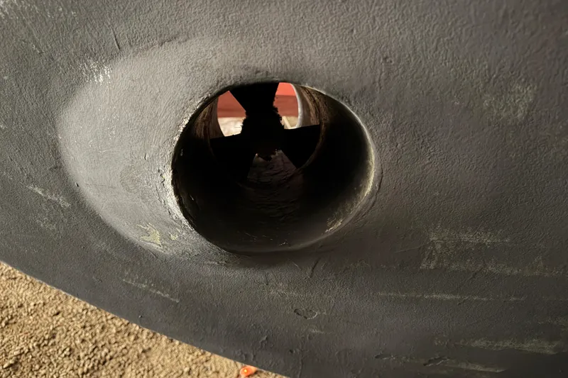 Slide: The Image of Close-up of a 2003 Snug Harbor Shearwater boat's bow thruster tunnel. - 7
