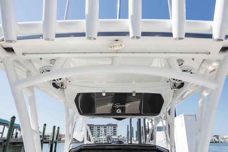 Slide: The Image of 2018 Nor-Tech 390 Sport Center Console boat with sleek design and modern features. - 16