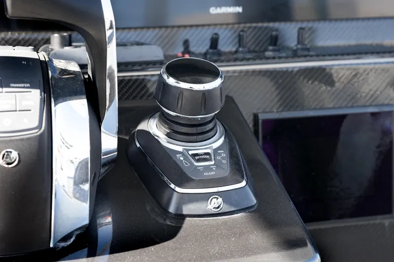 Slide: The Image of Control panel of 2018 Nor-Tech 390 Sport Center Console with joystick and throttle. - 19