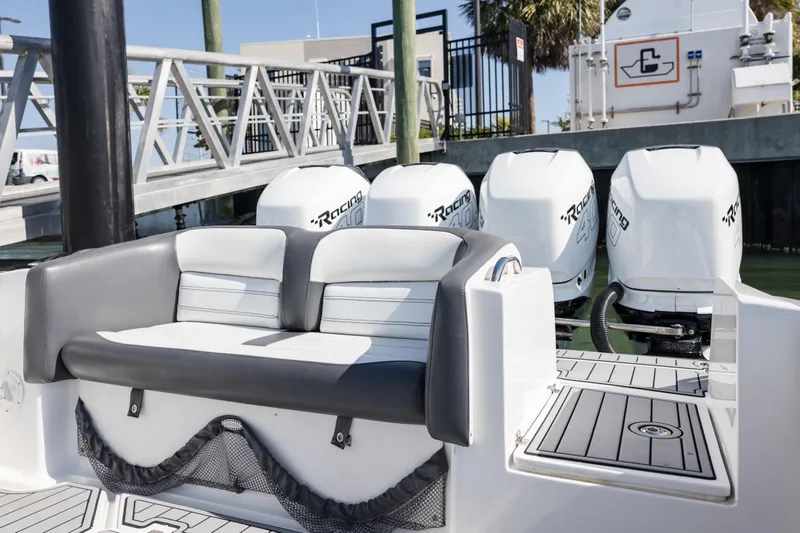 Slide: The Image of 2018 Nor-Tech 390 Sport Center Console with quad Racing 400 engines at dock. - 5