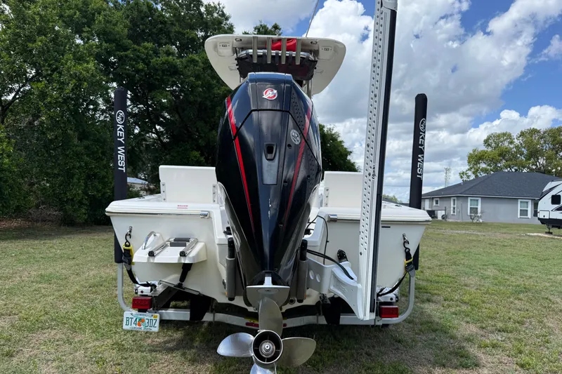 Slide: The Image of Rear view of 2020 Key West 230 Bay Reef boat with outboard motor. - 11