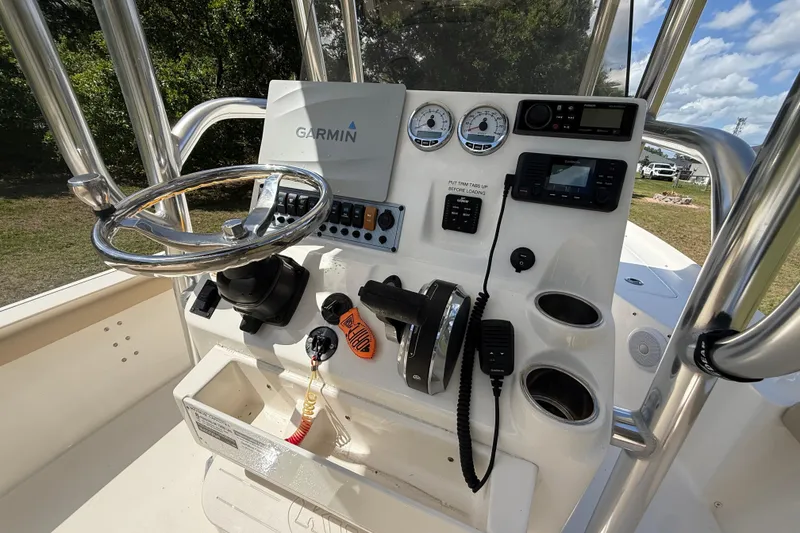 Slide: The Image of 2020 Key West 230 Bay Reef boat console with Garmin navigation and control panel. - 18