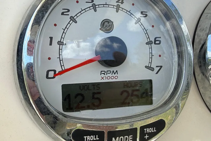 Slide: The Image of Close-up of a 2020 Key West 230 Bay Reef tachometer showing 12.5 volts and 254 hours. - 26