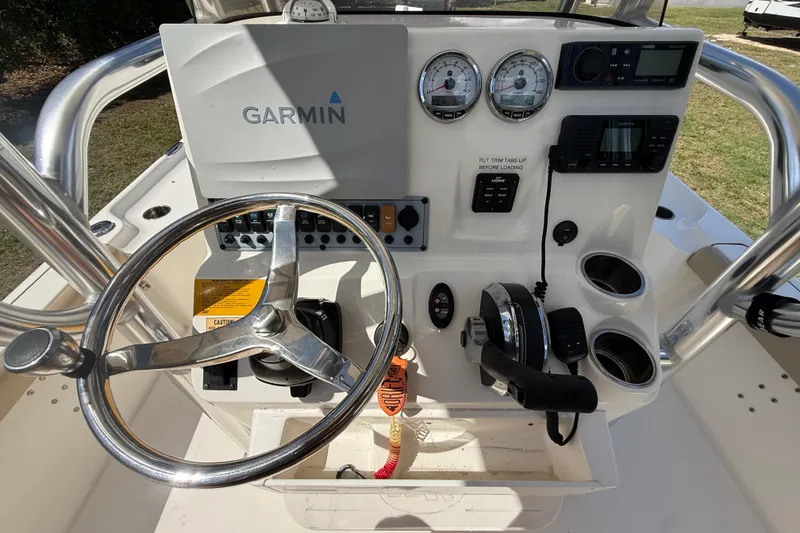 Slide: The Image of 2020 Key West 230 Bay Reef boat console with Garmin navigation and control panel. - 27
