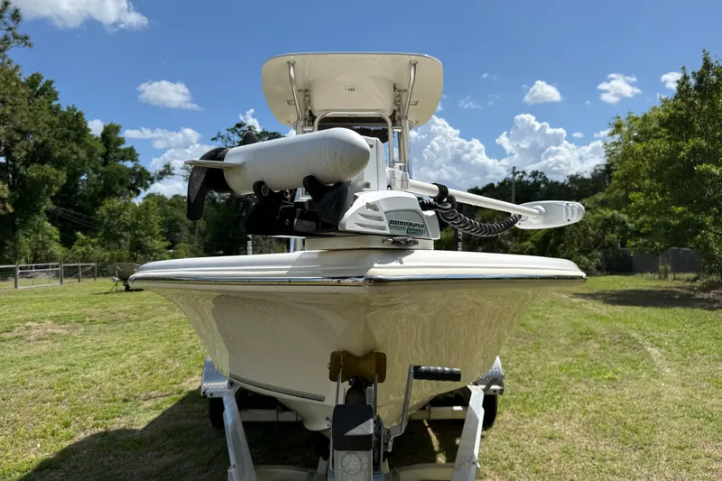 Slide: The Image of 2020 Key West 230 Bay Reef boat on trailer, sunny day, grassy area, blue sky. - 5