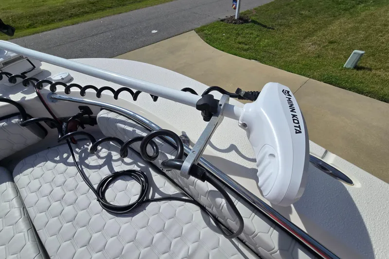 Slide: The Image of Minn Kota trolling motor on 2024 Carolina Skiff 24 Ultra Elite boat deck. - 21
